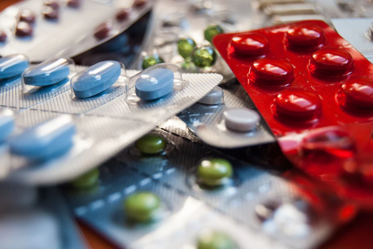 Colourful blister packs full of tablets.