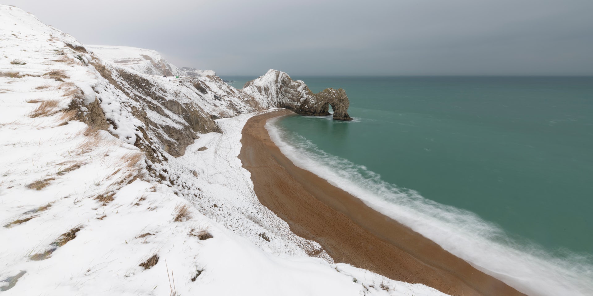 A snowy coastline.