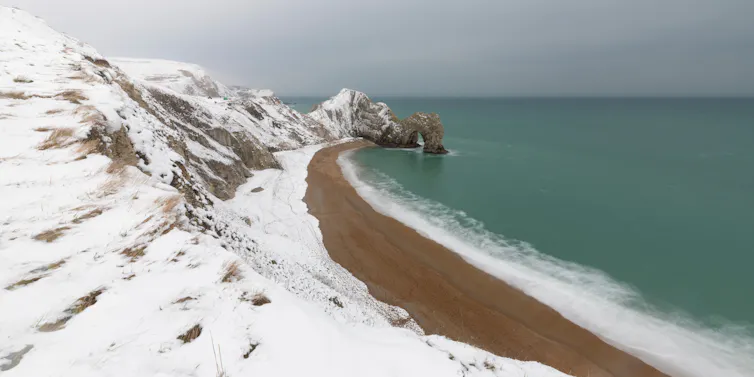 A snowy coastline.