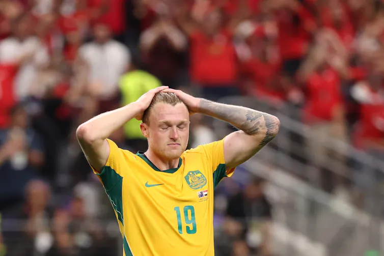 Souttar holds his hands to his head.