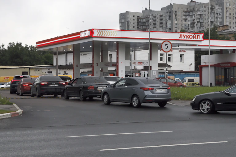 Vehicles queue outside a petrol station in St. Petersburg.