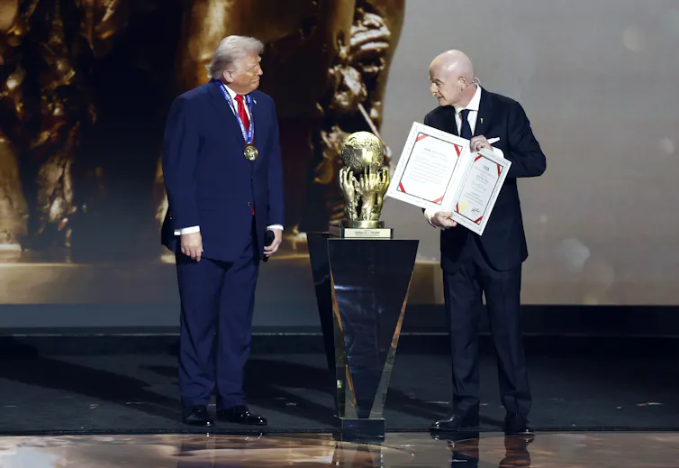 Fifa president, Gianni Infantino, presents the US president, Donald Trump with the 'Fifa Peace Prize'.