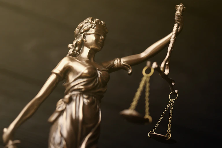 Statue of lady justice with scales