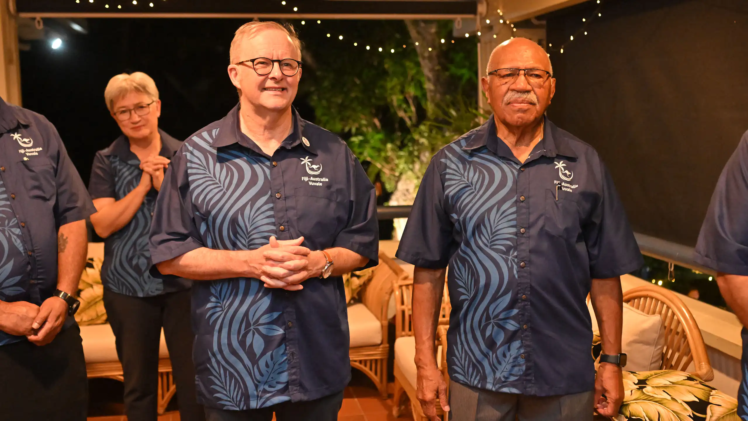 Anthony Albanese and Sitiveni Rabuka wearing matching shirts