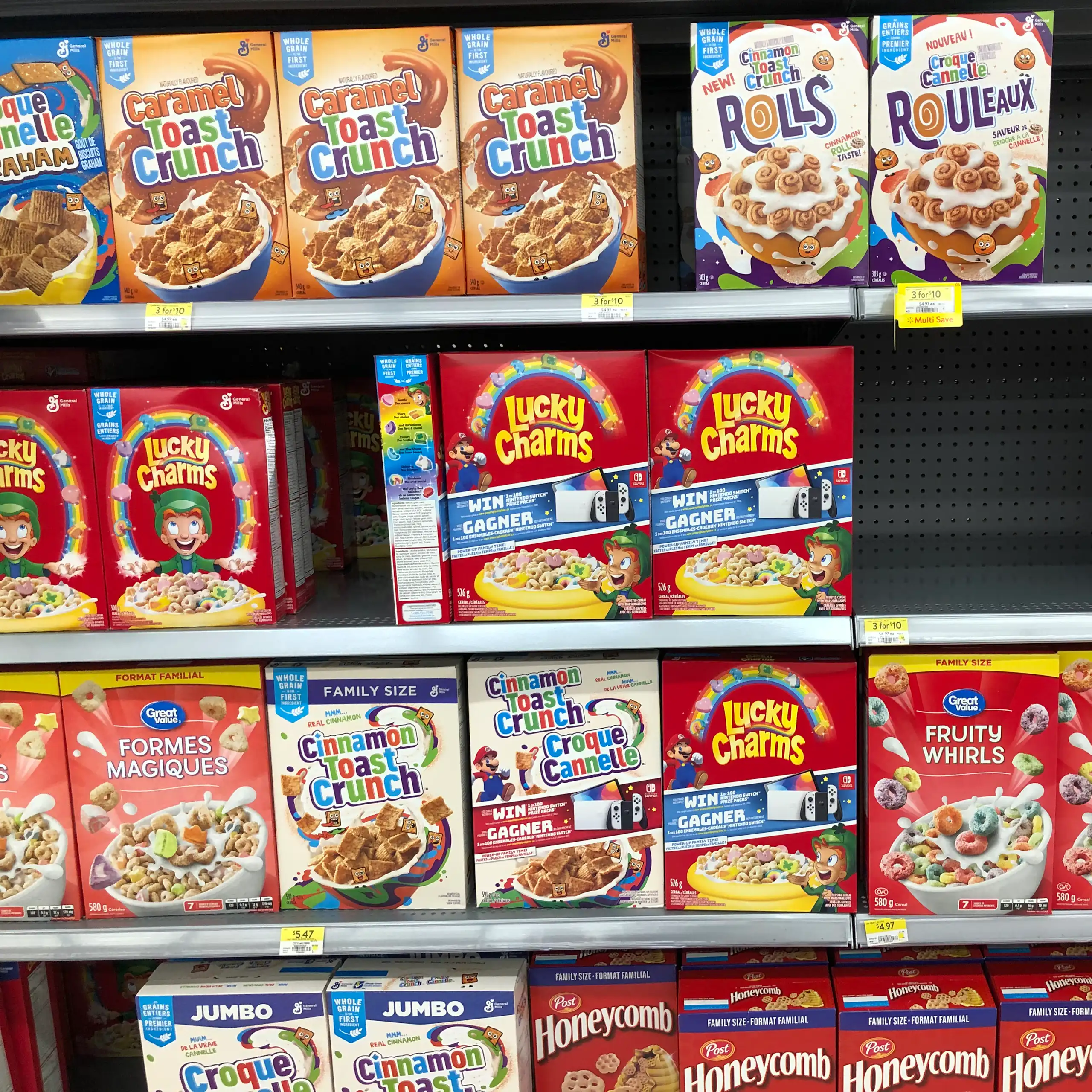 Different brands of breakfast cereal on a grocery store shelf