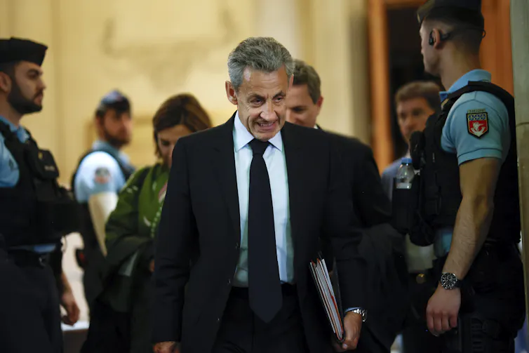 Former French president, Nicolas Sarkozy leaves a Paris court in May 2026.