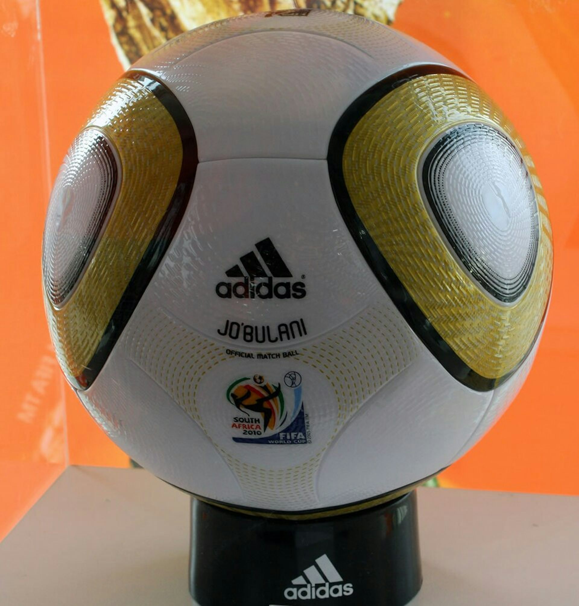 Soccer ball with exposed 'adidas' and 'JABULANI'