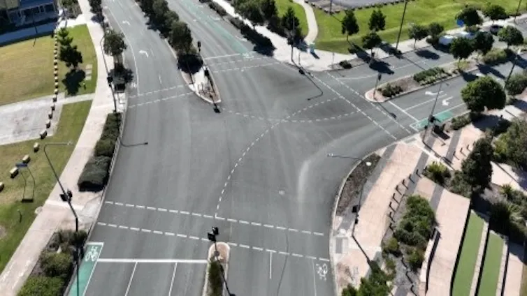 Aerial view of the intersection of Moreton Parade and Paper Avenue in Petrie, Queensland, where AI-powered traffic signals are being tested.
