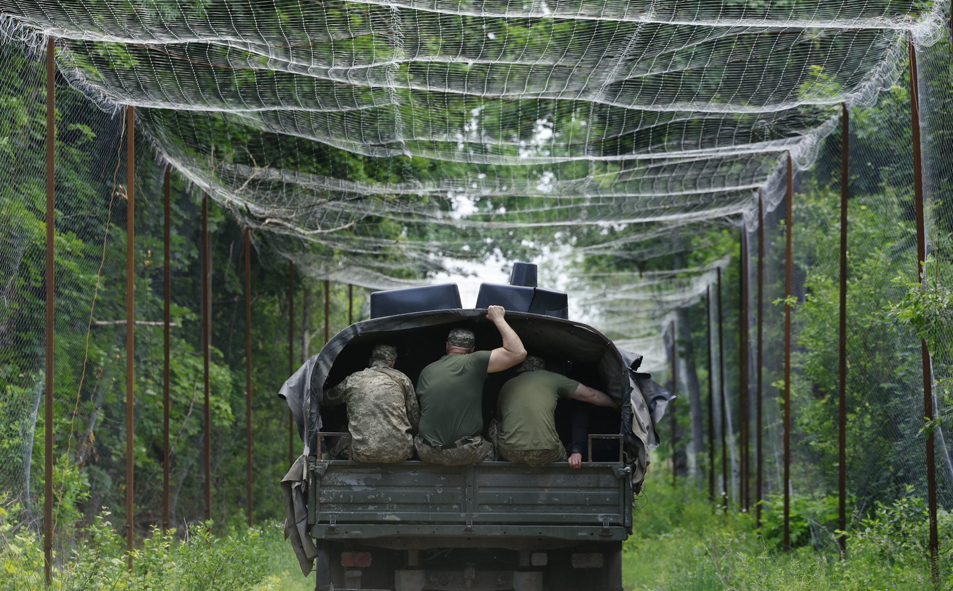 Ukrainian servicemen build up fortifications in the Chernobyl exclusion zone.