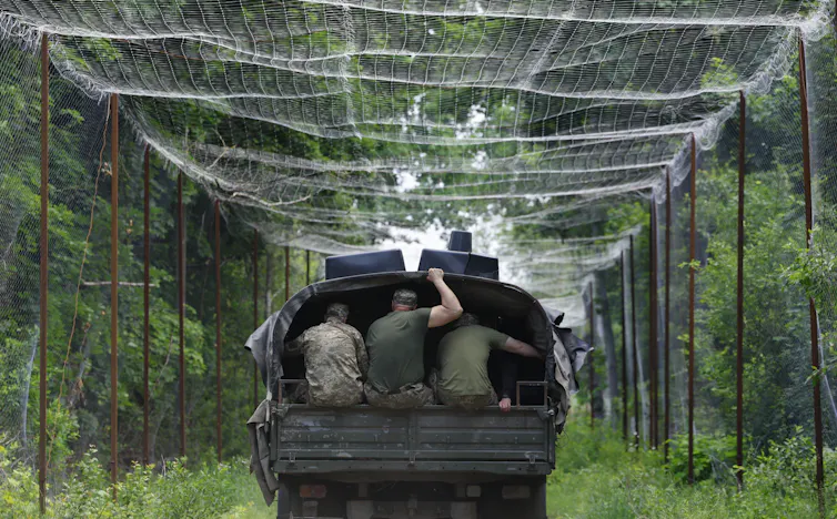 Ukrainian servicemen build up fortifications in the Chernobyl exclusion zone.