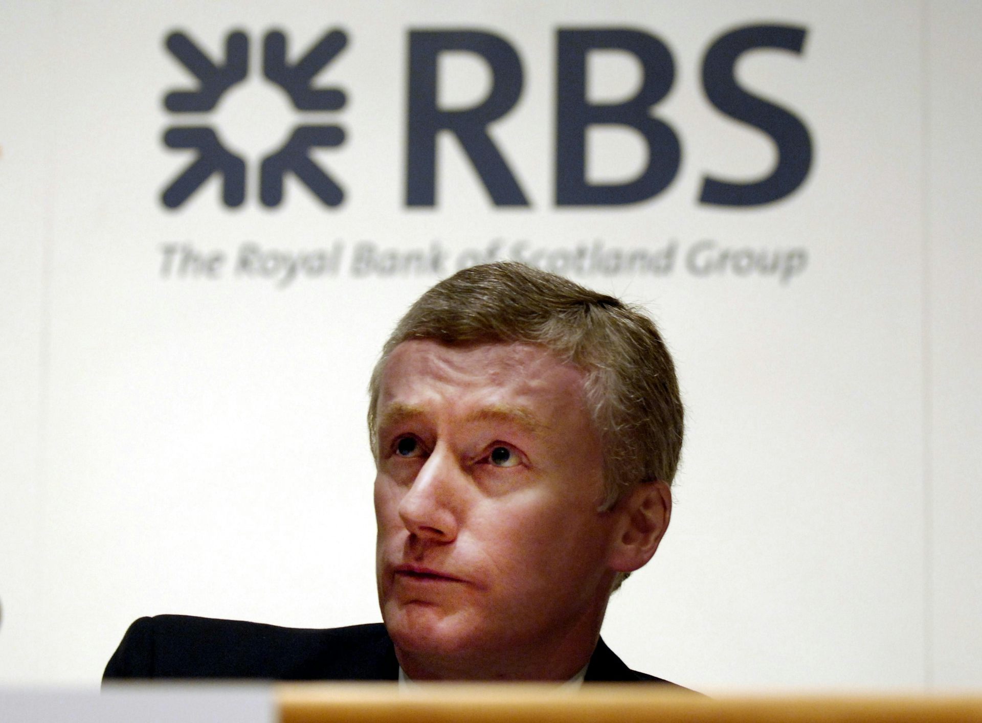 Fred Goodwin and the RBS logo