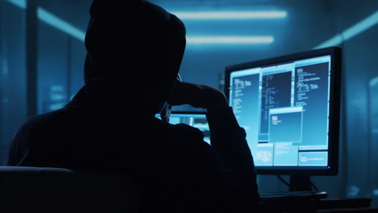 Cybercriminal at work.