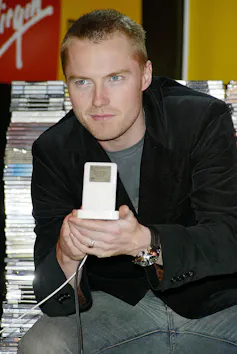 Ronan Keating with an iPod