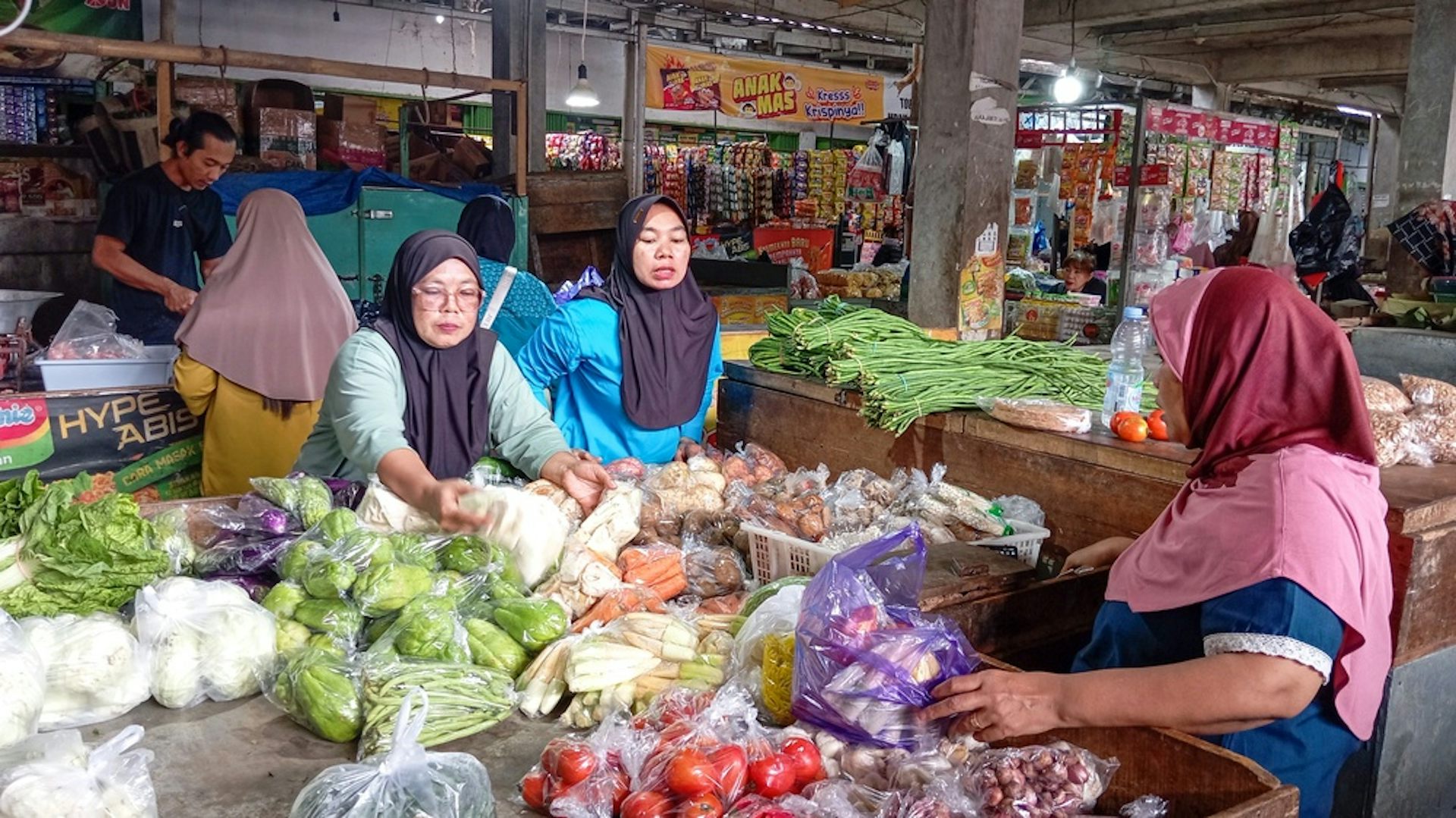 Women selling vegetables in an Indonesian market.