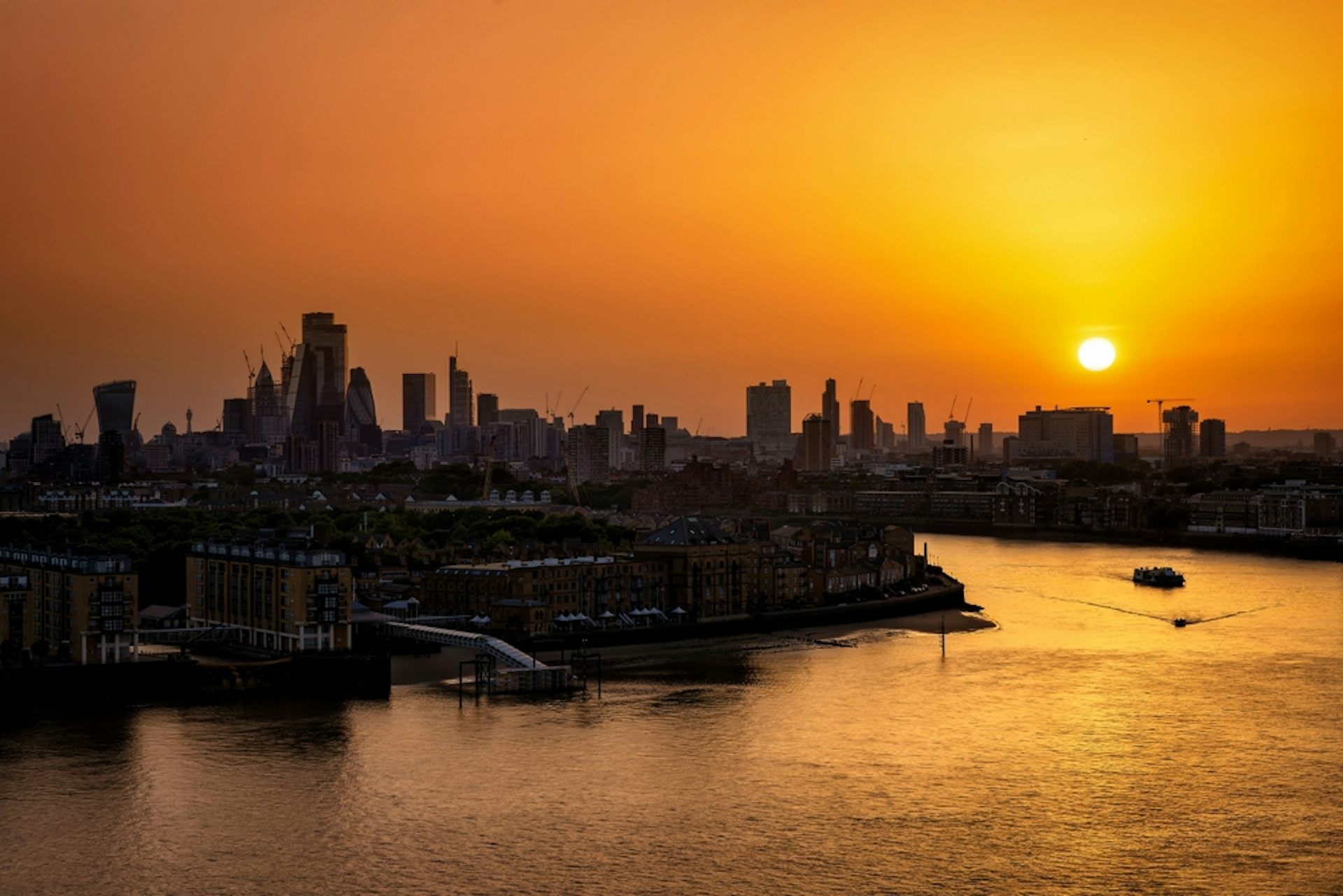 The sun setting over London.