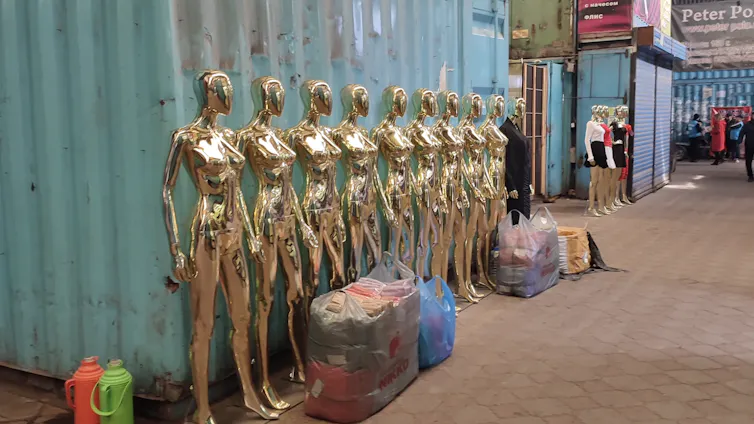 Mannequins lined up along a container in the eastern part of the 100-hectare Dordoi Bazaar.
