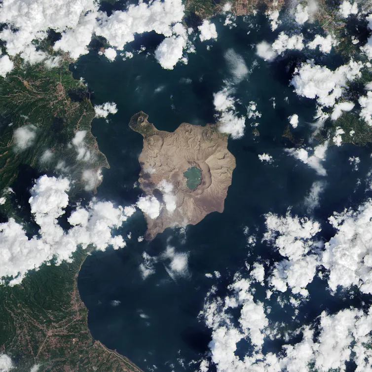 Aerial photo of an island in a lake.