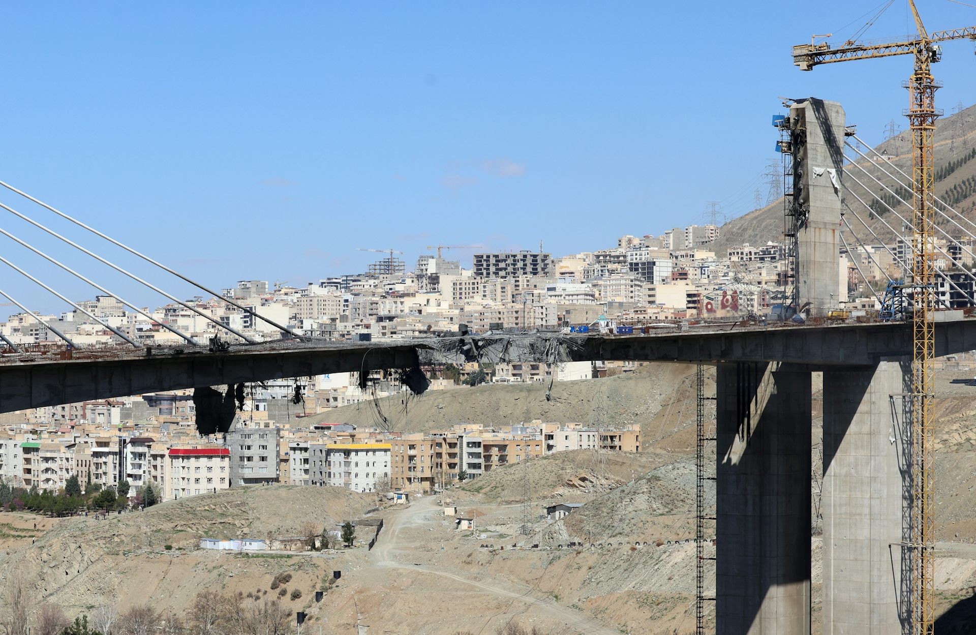 A damaged suspension bridge in the city of Karaj.