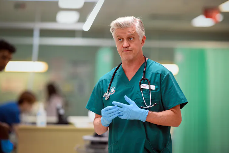 Production image: Wyllie as a doctor in the ER.