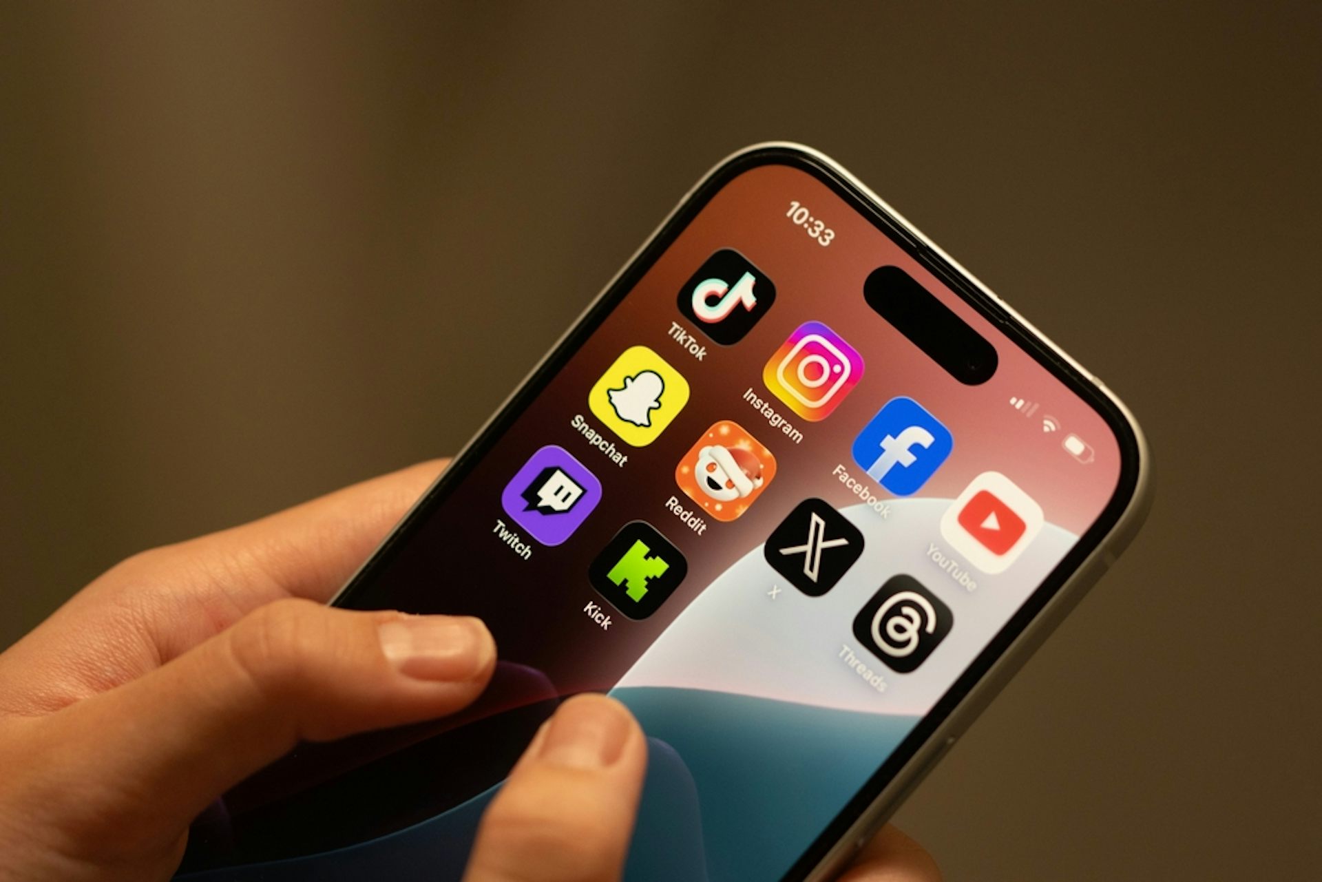 A phone screen showing various popular social media apps.