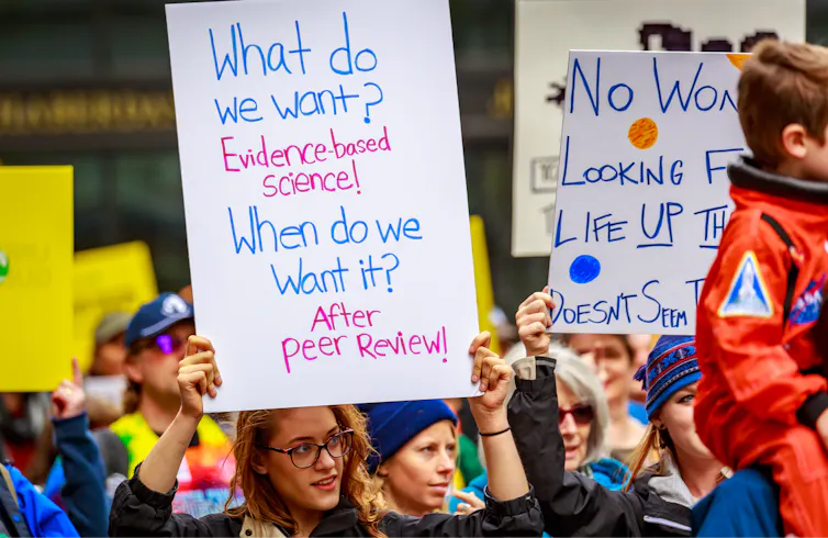 Protesters holding placards at the 2018 Portland March for Science.