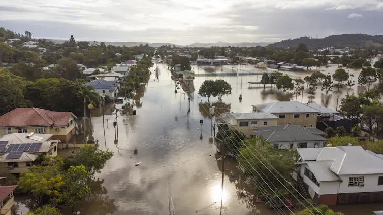 A aerial image of a flooded street in Lismore.