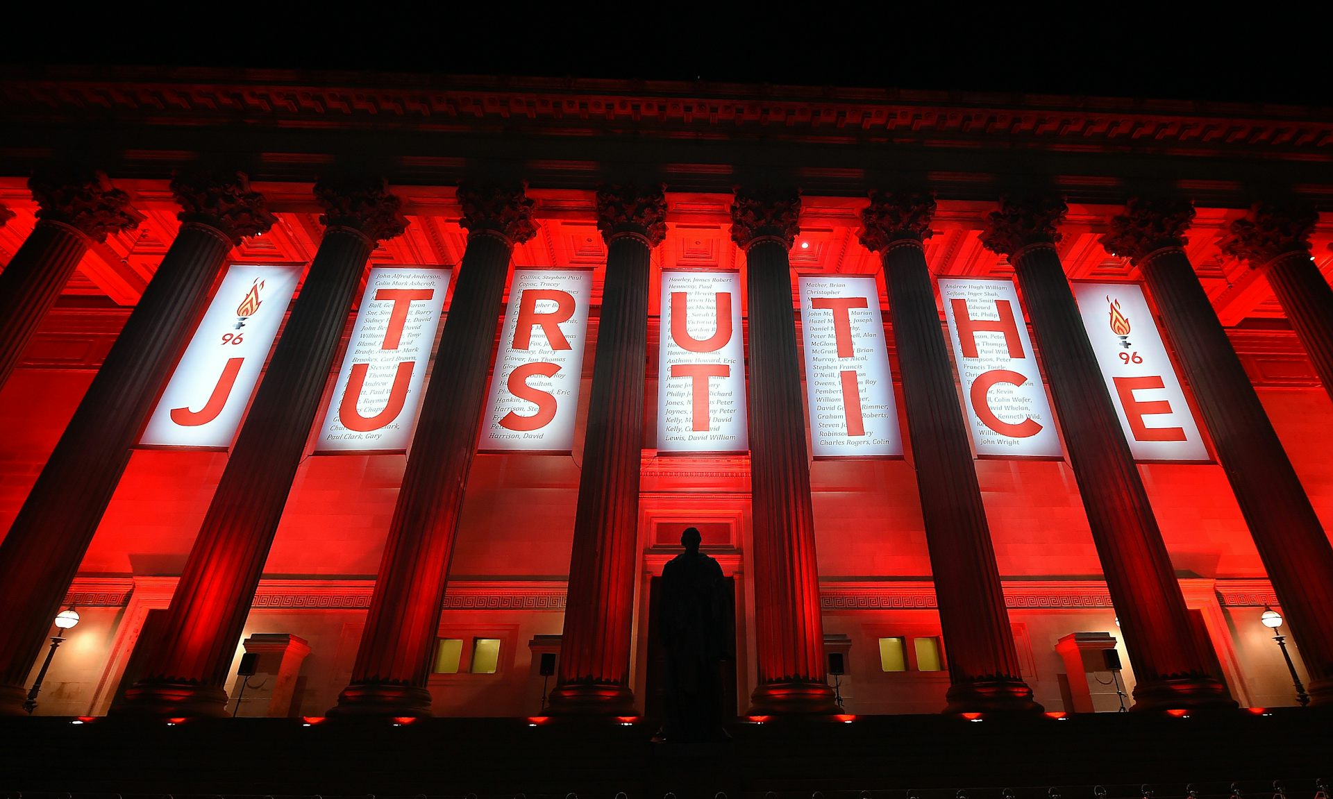 A building with signs saying 'truth' and 'justice'