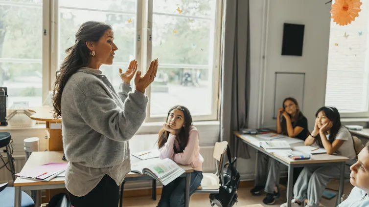A teacher and students in the classroom