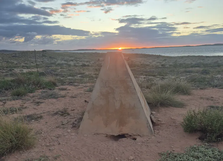 a stone pyramid in arid scrub