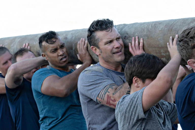 Pete Hegseth joining in with military exercise.