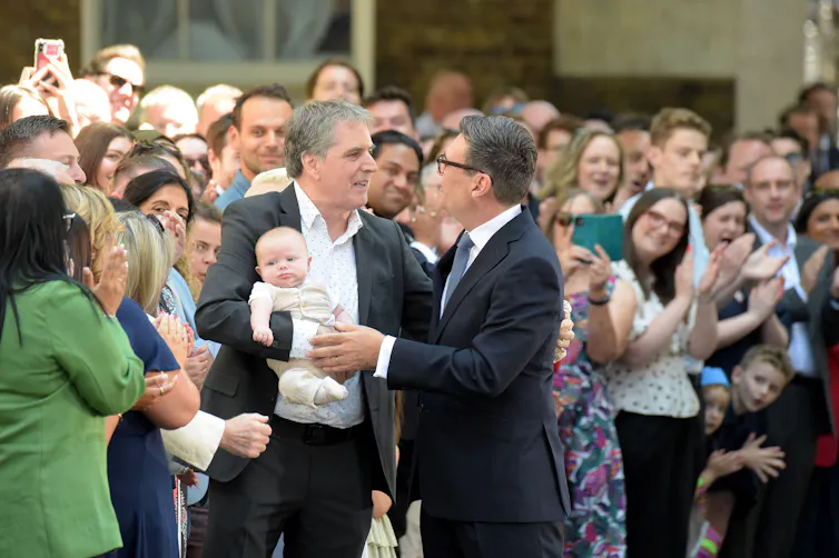 new british prime mimister andy burnham is greeted by liverpool mayor steve rotherham in downing street.