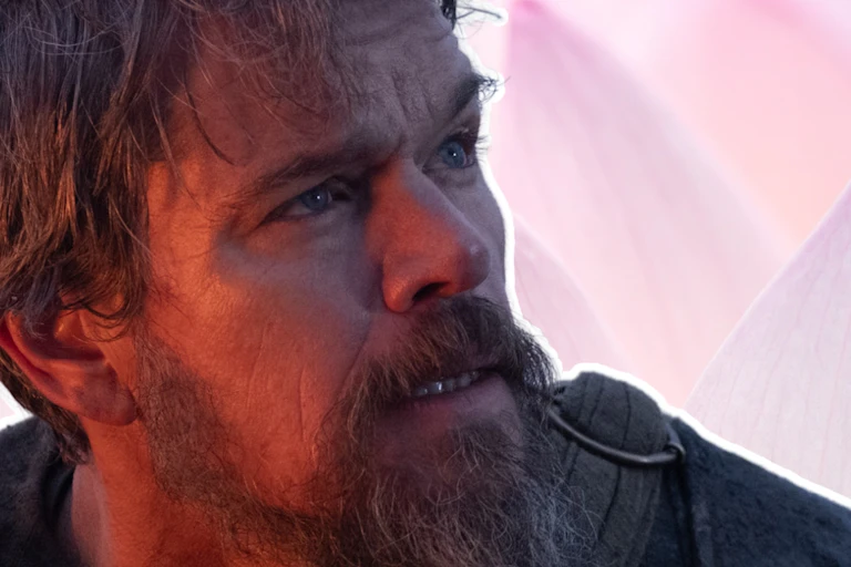 Matt Damon as Odysseus and a lotus flower.