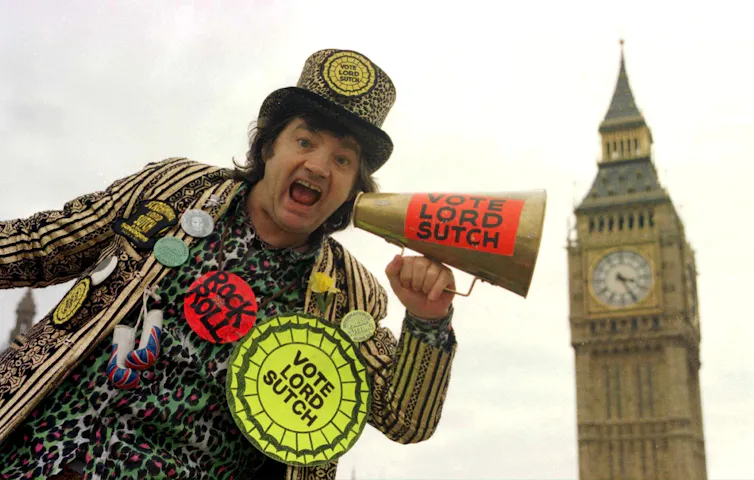 'Screaming Lord Sutch' in costume in front of Big Ben, London