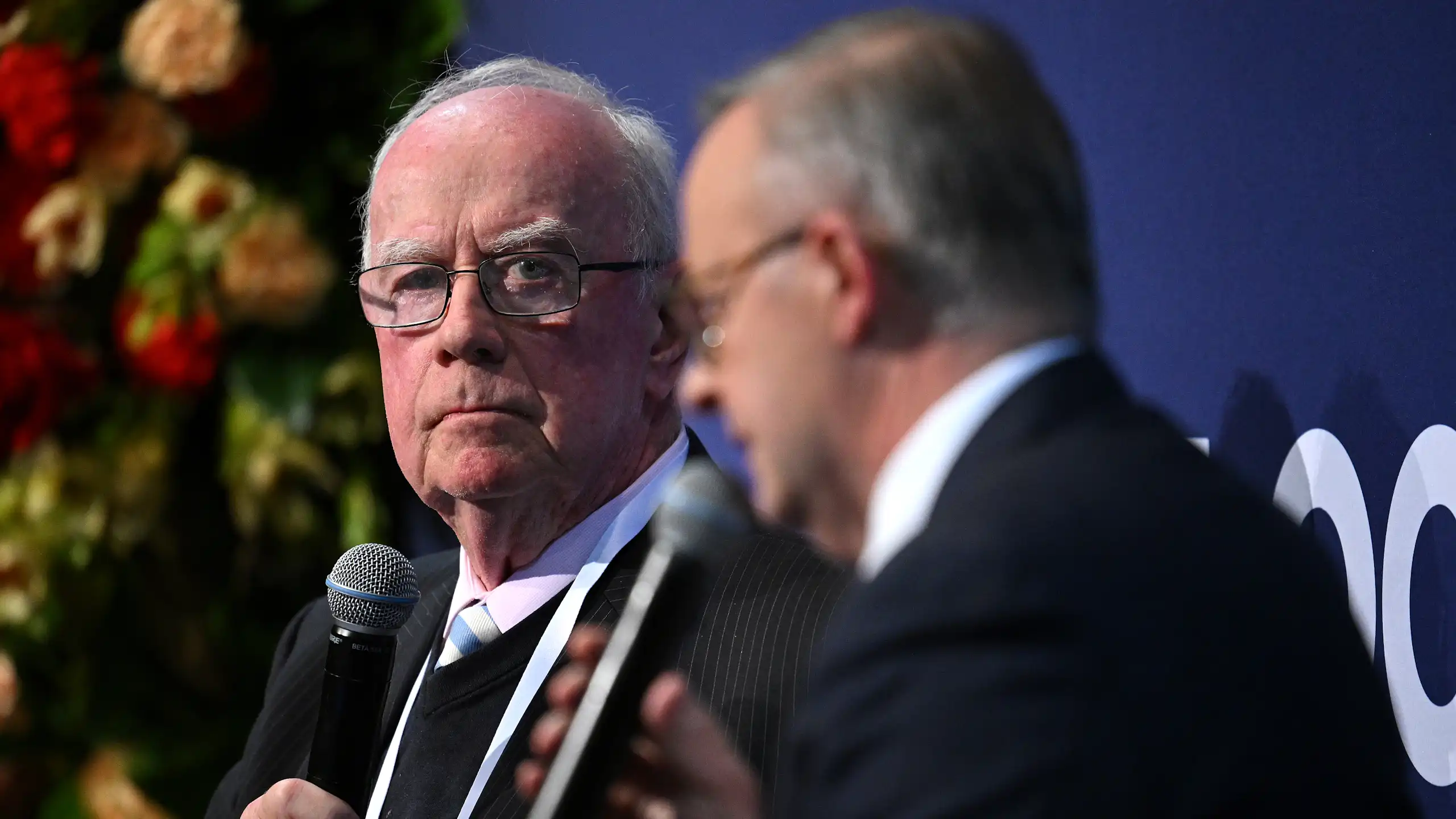 Editor-at-Large of The Australian Newspaper, Paul Kelly, speaks with Prime Minister Anthony Albanese at a conference in Melbourne, November 2022.