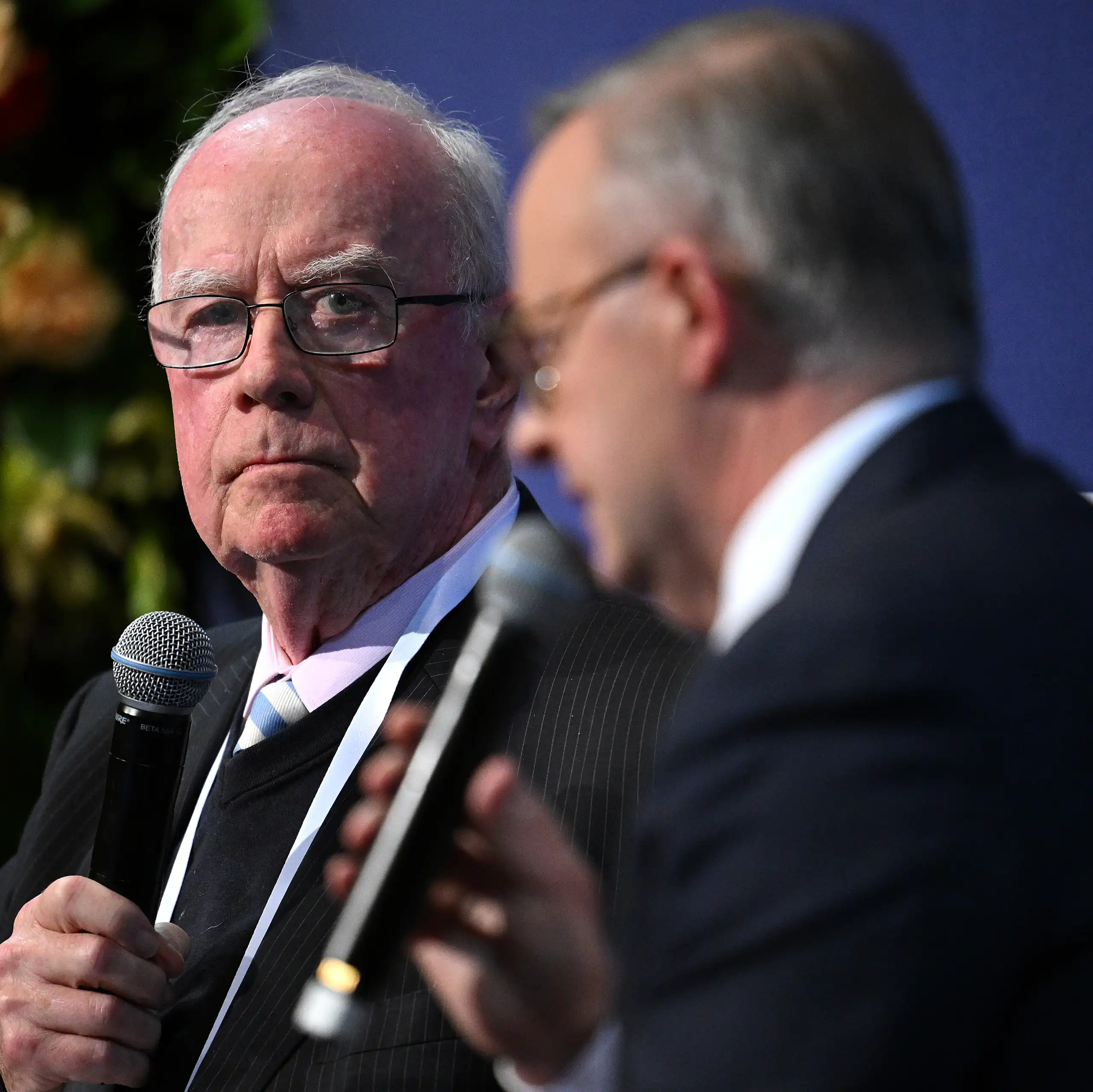 Editor-at-Large of The Australian Newspaper, Paul Kelly, speaks with Prime Minister Anthony Albanese at a conference in Melbourne, November 2022.