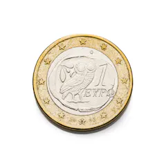 close up view of a Greek one Euro coin with owl figur