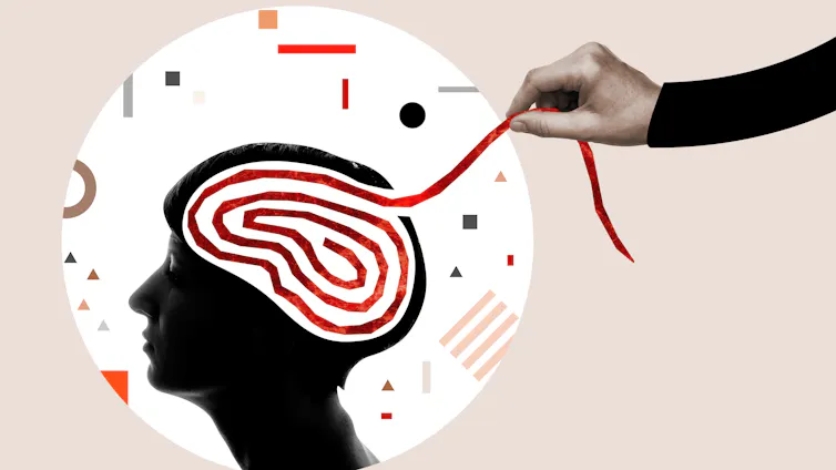 Una mano tira de un ovillo que representa el cerebro
