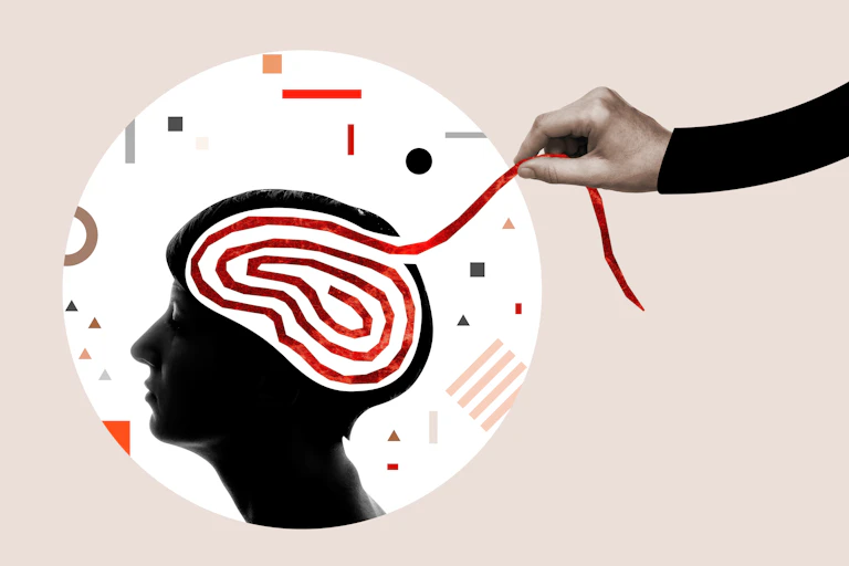Una mano tira de un ovillo que representa el cerebro