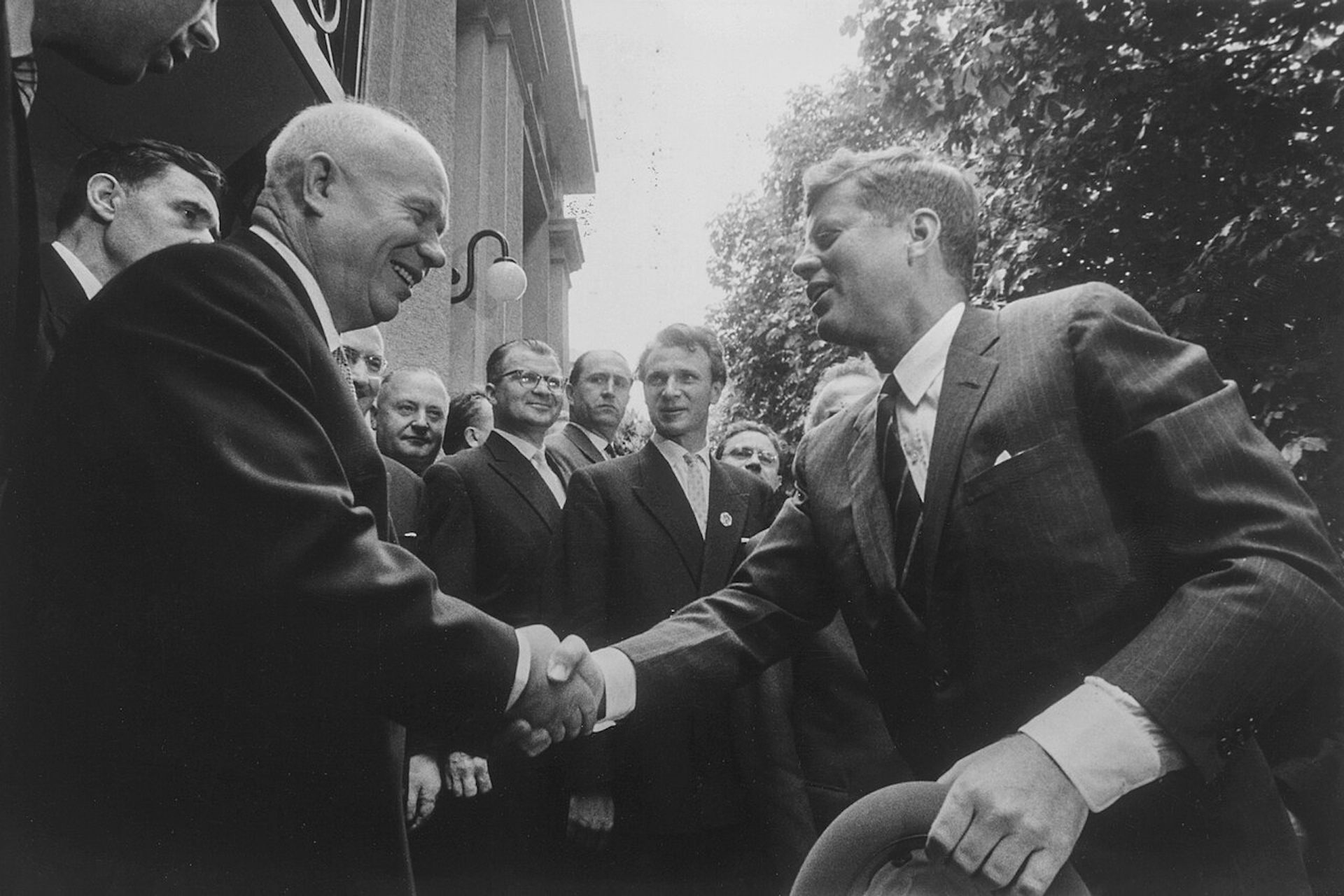 Nikita Krushchev shakes hands with John F Kennedy in Vienna, 1961.