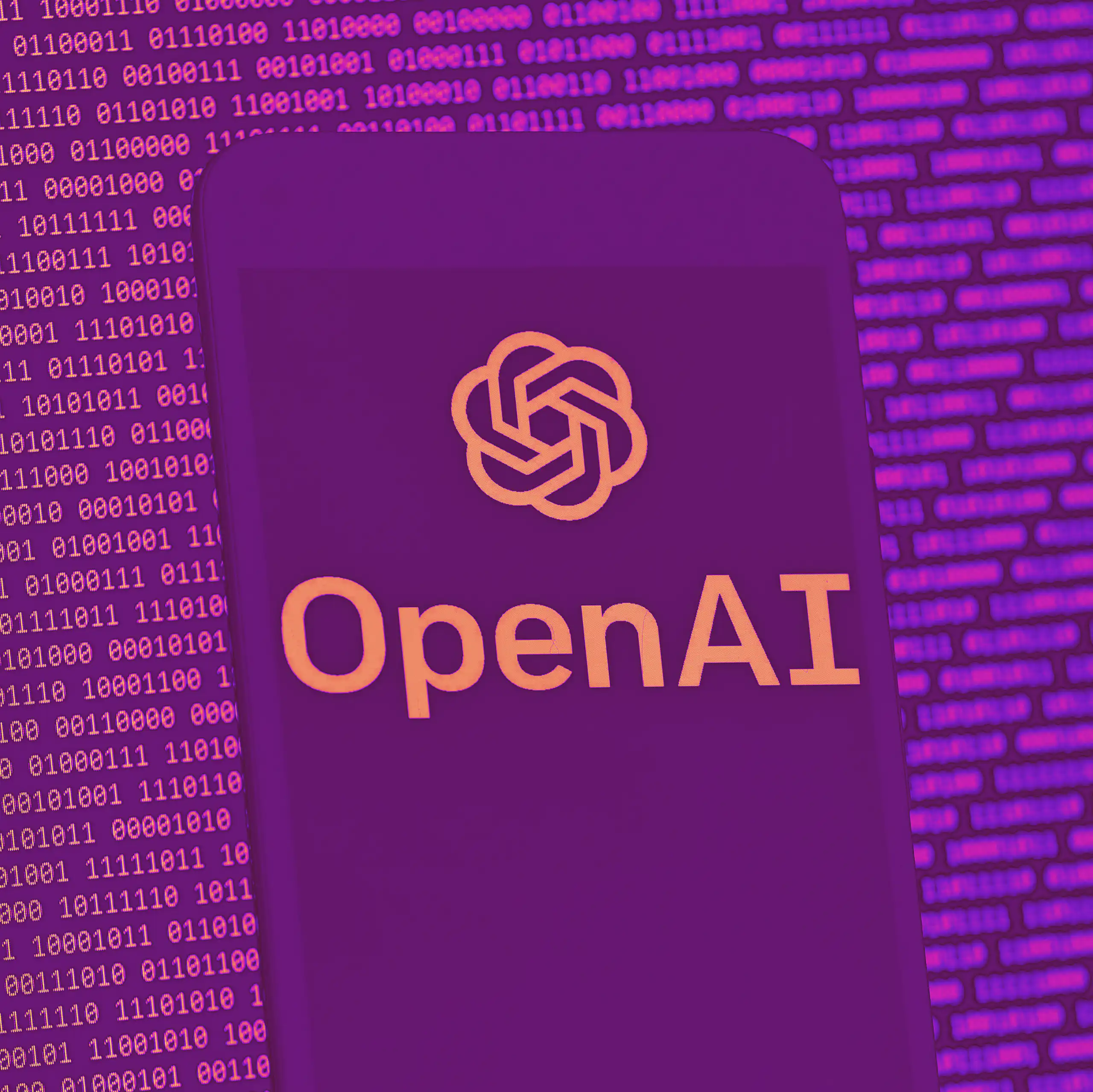 A mobile phone screen displaying the OpenAI logo, in front of a background of ones and zeroes.