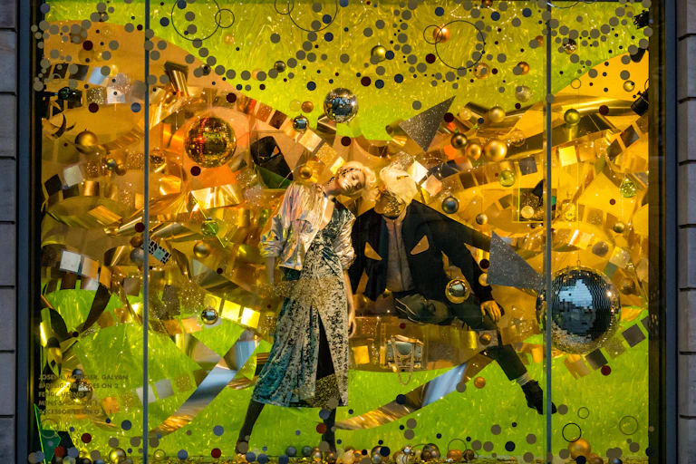 A colourful Christmas shop window at Harvey Nichols in London