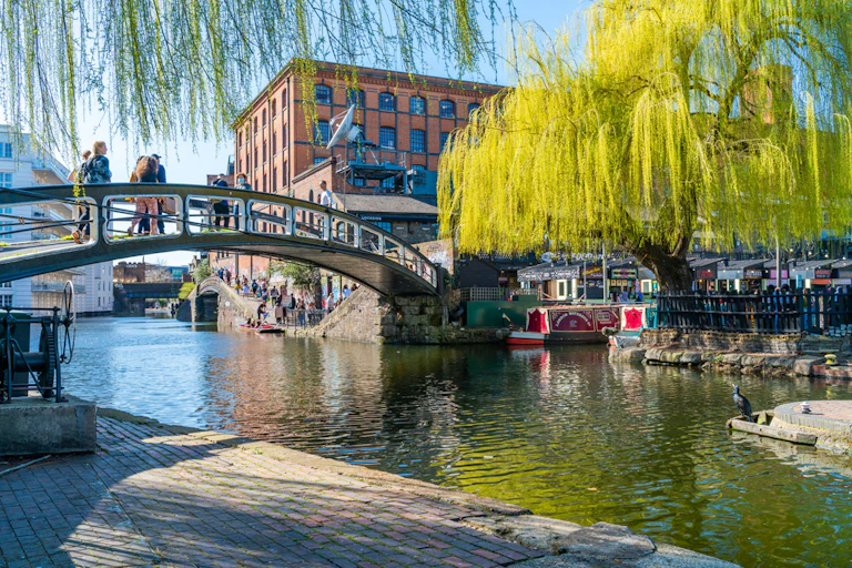 A canal boat moored on the Regent's Canal in London.