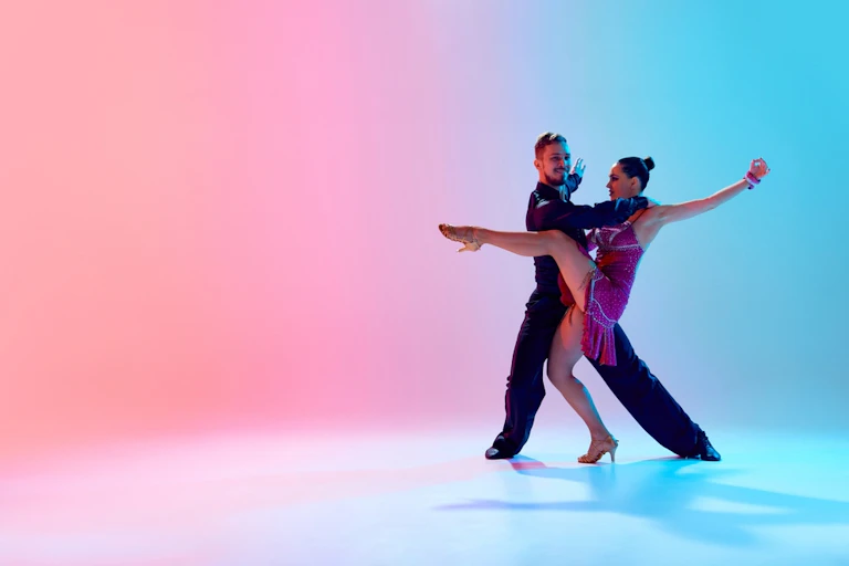 A couple doing ballroom dancing.