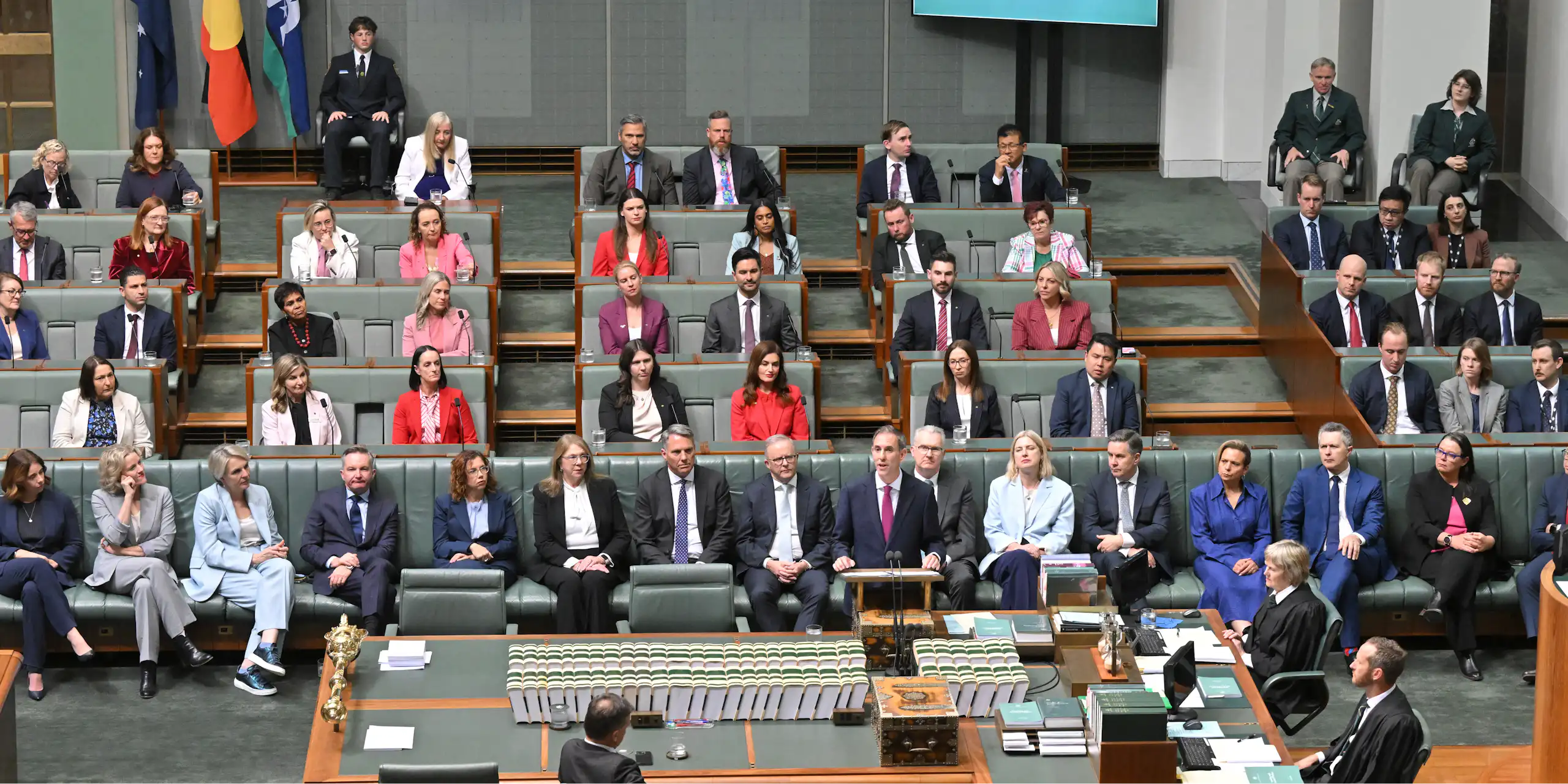 Labor politicians sit in their seats in the House of Representatives