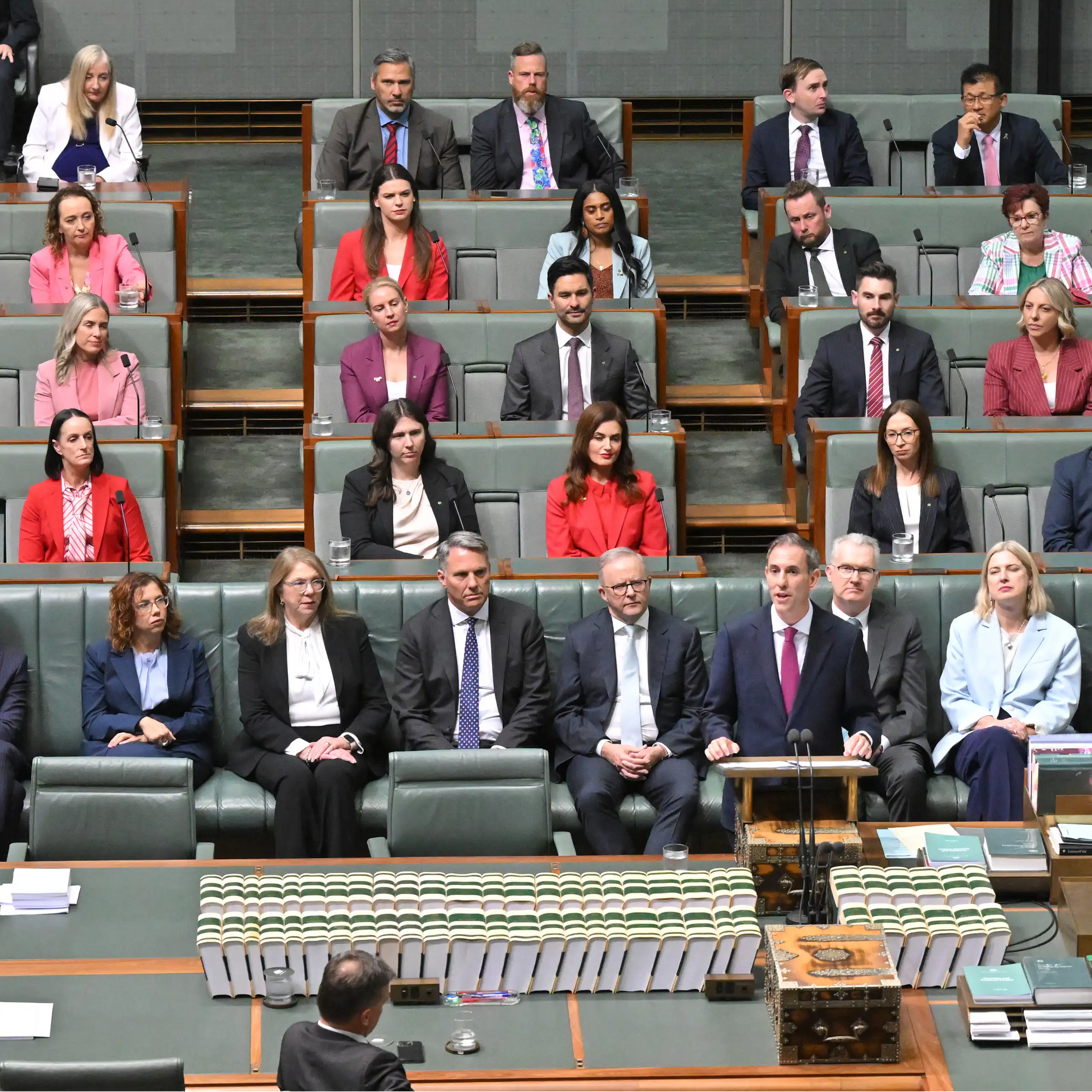 Labor politicians sit in their seats in the House of Representatives