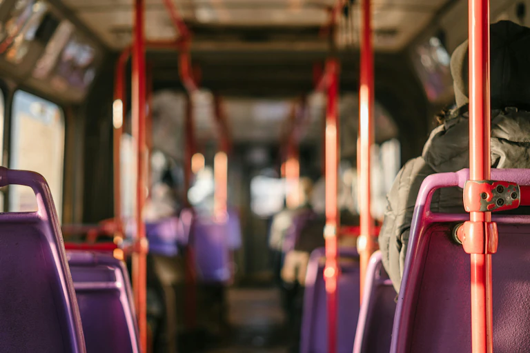 The inside of a transit bus.