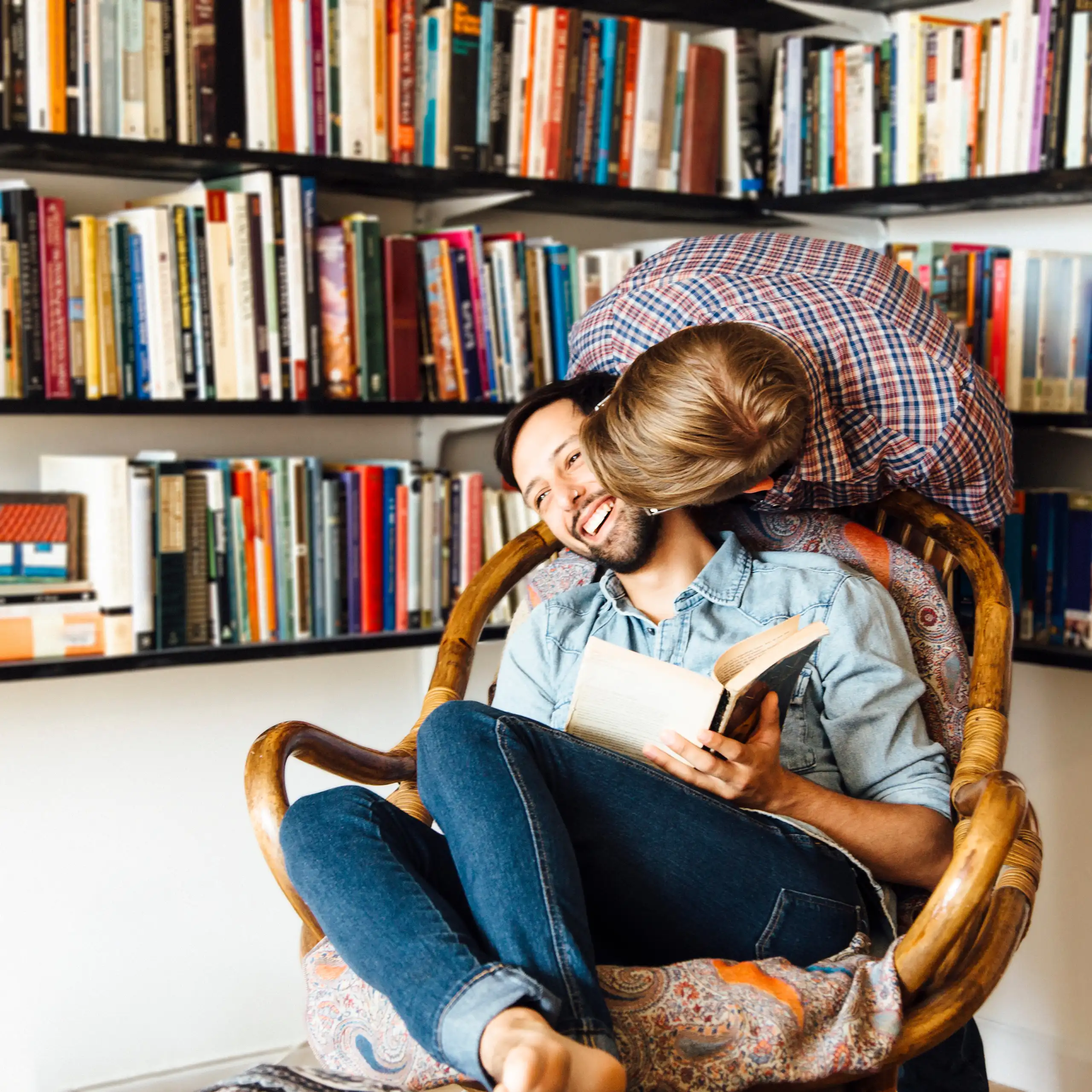 Male couple at home, fooling around, laughing