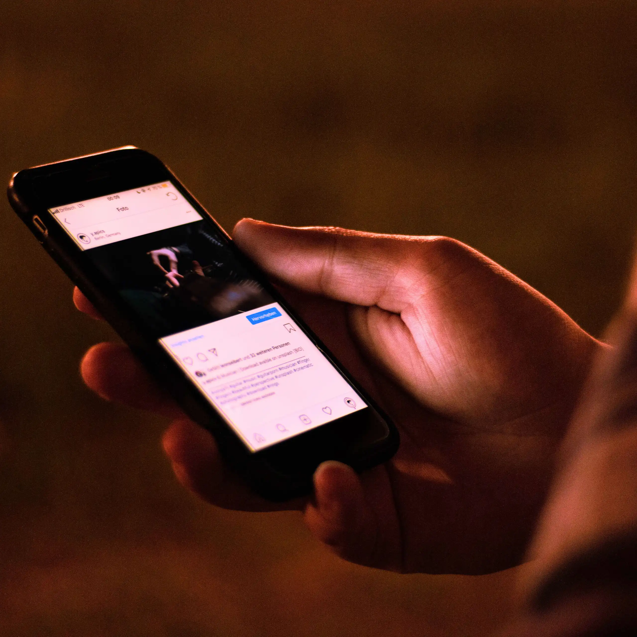A person scrolling on a social media feed.