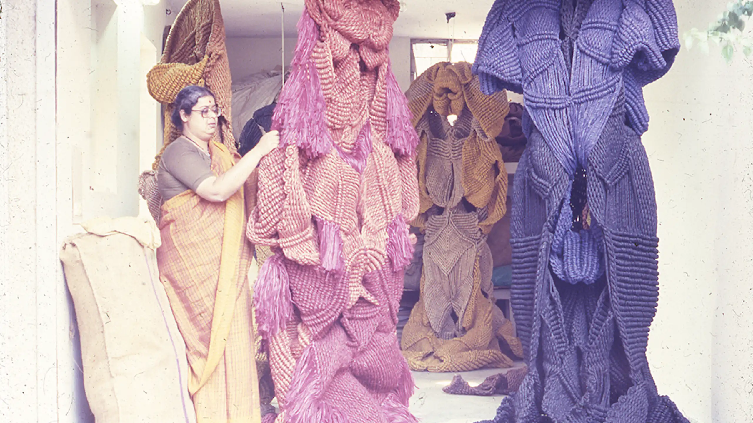 Mrinalini Mukherjee with large hemp sculptures