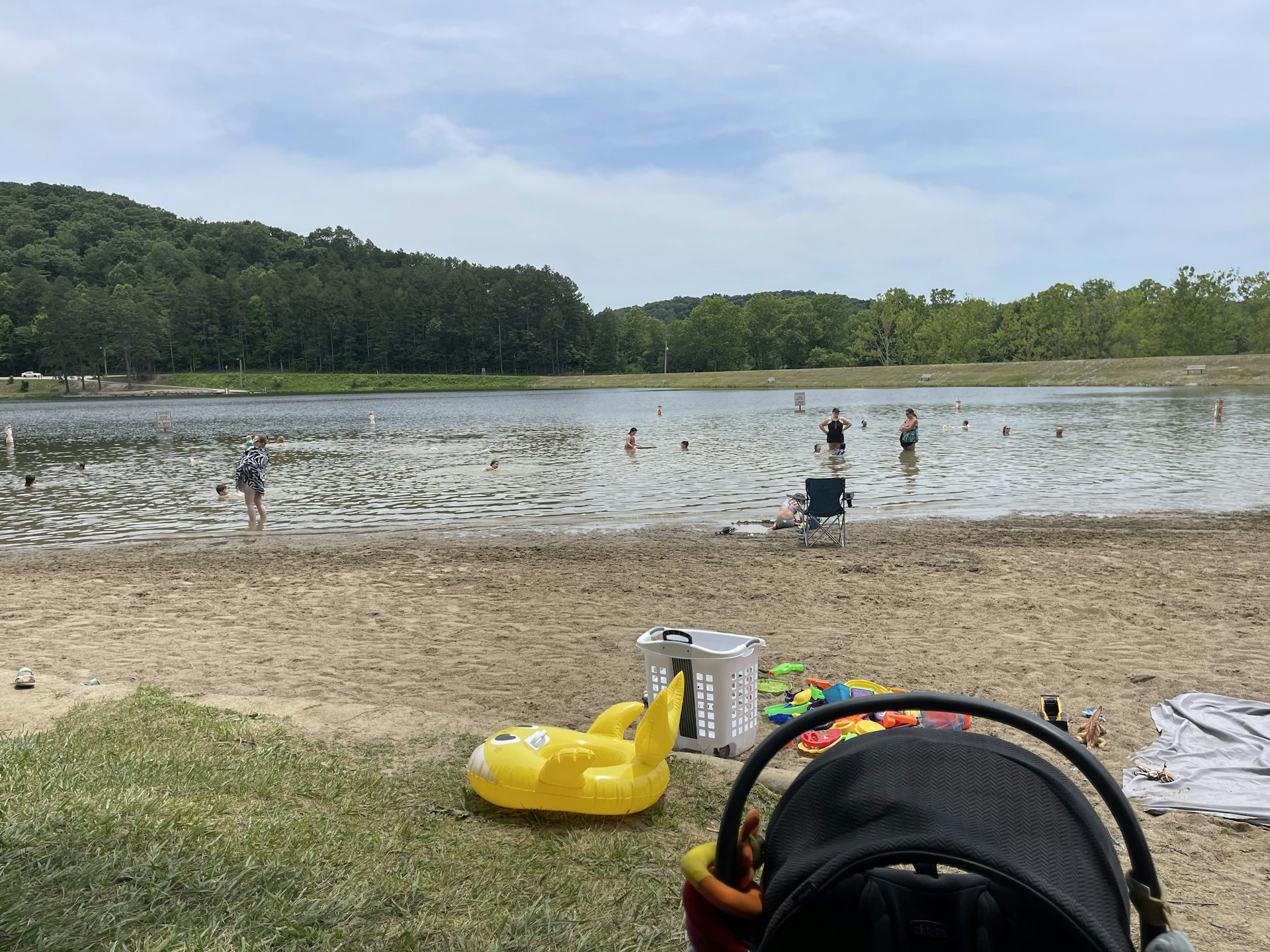 People play in a lake that has shrunk